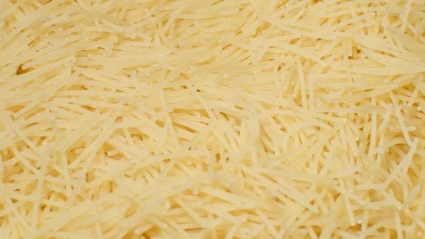 Pile Raw Yellow Pasta Spins Circle Flour Products Macaroni Vegetarian — Stockvideo