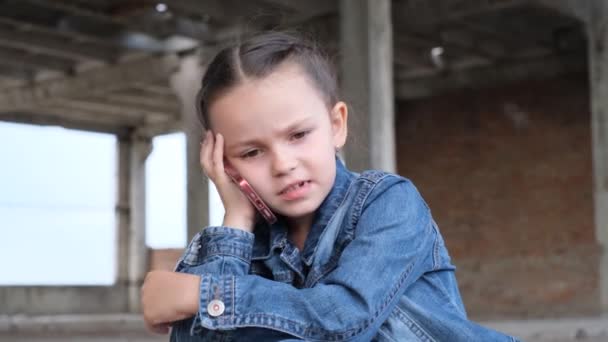 Small Ukrainian Refugee Girl Talking Phone While Sitting Suitcase Upset — Vídeos de Stock