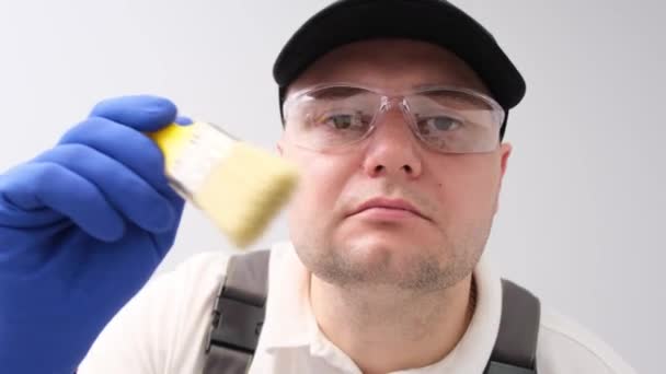 Portrait Male Construction Painter Holding Brush Moving Camera White Background — Stock video