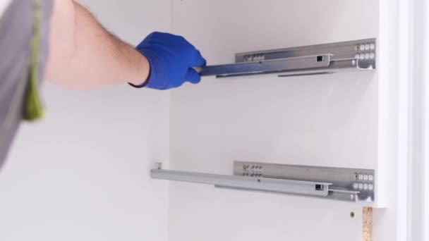 Man Installs Furniture Kitchen Screwdriver Repair Accessories House Concept Home — Stock video
