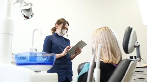 Female Patient Dental Chair Dental Treatment Modern Dental Office — стоковое видео