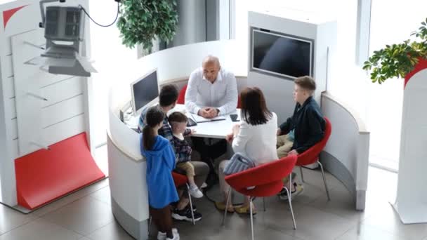 Young Family Children Buys Apartment Flat House Modern Office Buying — Video