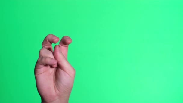 Χέρι Ενός Νεαρού Πράσινο Φόντο Ένα Αντρικό Χέρι Δείχνει Ενδιαφέρουσες — Αρχείο Βίντεο
