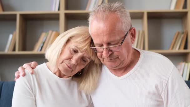Old Sad Couple Depression Grandfather Grandmother Hugging Sitting Sofa Anxiety — Stock video