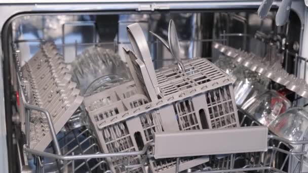 Woman Arranges Dishes Dishwasher Automatic Washing Make Household Chores Easier — Stockvideo