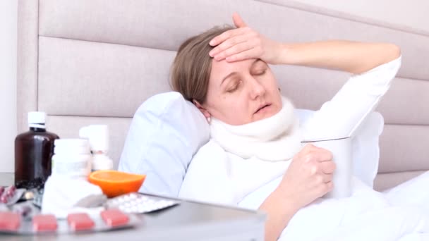 Health People Girl Lies Bed Feels Sick Sneezes Drinks Hot — Stockvideo