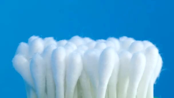 Many Cotton Swabs Isolated Blue Background Ear Sticks Safe Use — Wideo stockowe