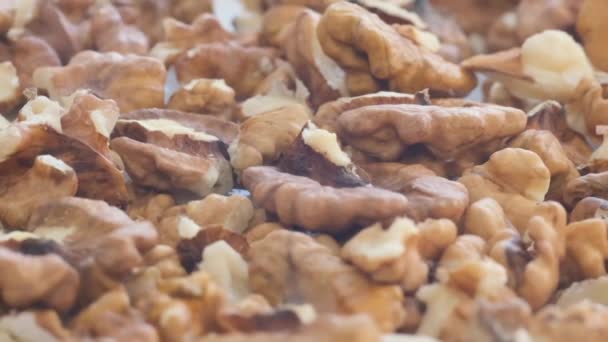 Фон Вращающегося Грецкого Ореха Скорлупы Больших Количествах Очищенный Орех Натуральный — стоковое видео