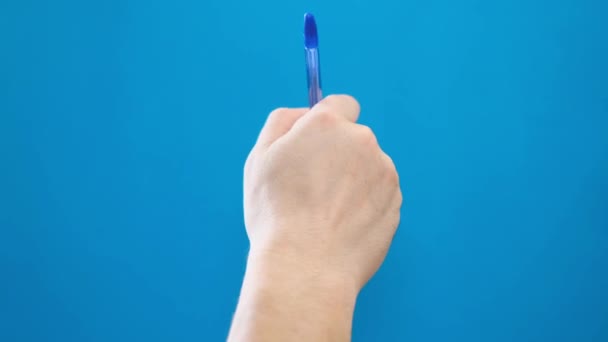 Close Male Hand Writing Text Ballpoint Pen Blue Chromakey Background — Wideo stockowe
