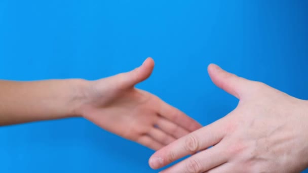 Close Man Woman Holding Hands Greeting Blue Background Video — Stock Video