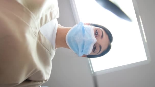 Female Dentist Mask Treats Patients Teeth Metal Tools View View — Stockvideo