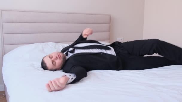 Tired Business Man European Appearance Falls Bed His Clothes Sleeps — Stock Video