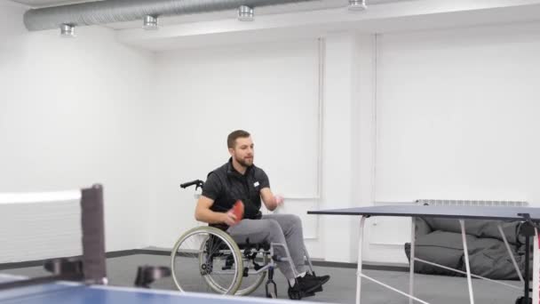 Young Man Wheelchair Plays Table Tennis Games Racket Sports Hobby — Stock Video