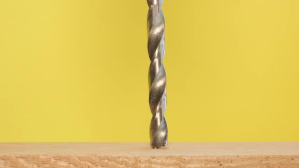 Metal Drill Makes Hole Tree Bright Yellow Background Work Wood — Stock Video