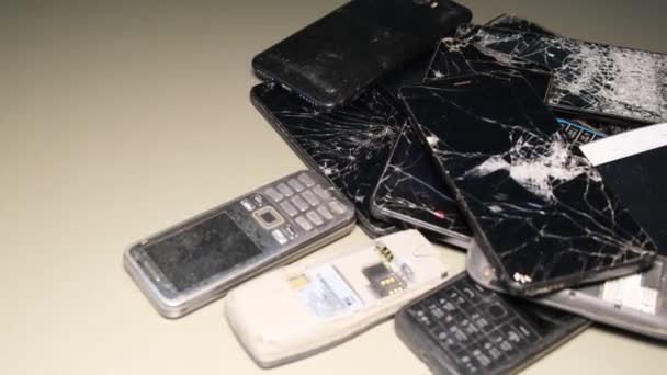 Dump Broken Phones Have Cracked Display Faulty Broken Outdated Equipment — Stock Video
