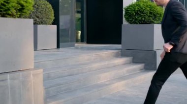 A business person runs to work in the office. Super Slow Motion 240.