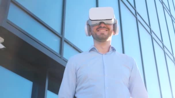 Office Worker Uses Virtual Reality Glasses While Standing Glass Business — Vídeo de Stock