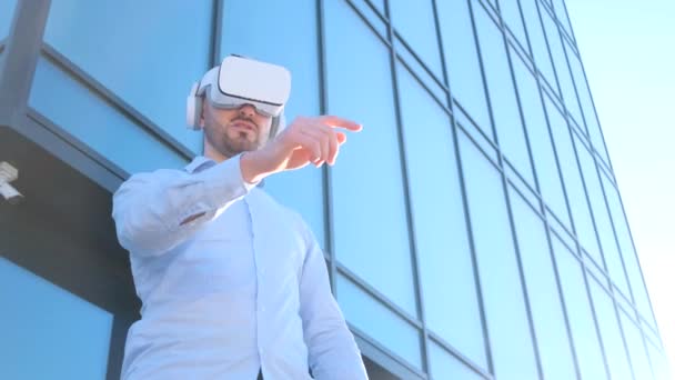 Stylish Businessman Using Virtual Reality Glasses Standing Front Business Center — стокове відео