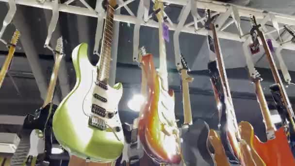 Many New Electric Guitars Interior Music Store Stringed Musical Instruments — Stockvideo