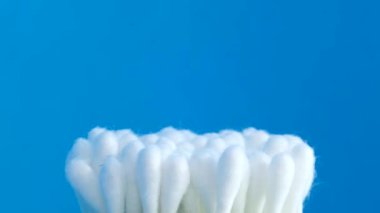 Cotton swabs on a dark background. Close up.