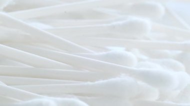 Plastic cotton swabs on a white background. Macro video