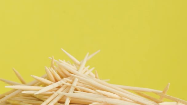 Wooden Bamboo Toothpicks Yellow Background Close Macro Video — Αρχείο Βίντεο