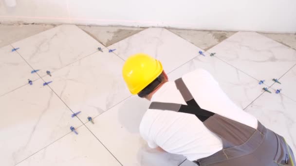 Worker Laying Large Wide Format Floor Tiles Video — Stockvideo