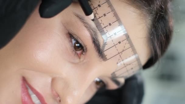Vertical Video Beautician Performing Permanent Eyebrow Make Procedure Using Special — Video