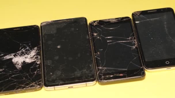 Old Broken Smartphone Smartphones Yellow Background Smart Phone Broken Screen — Vídeos de Stock