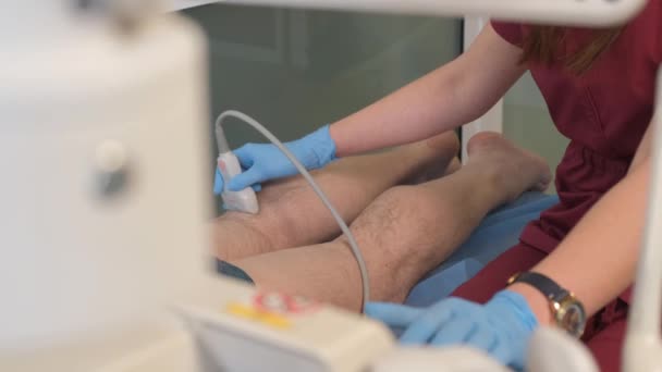 Professional Doctor Takes Ray Elderly Mans Legs Treatment Varicose Veins — стоковое видео
