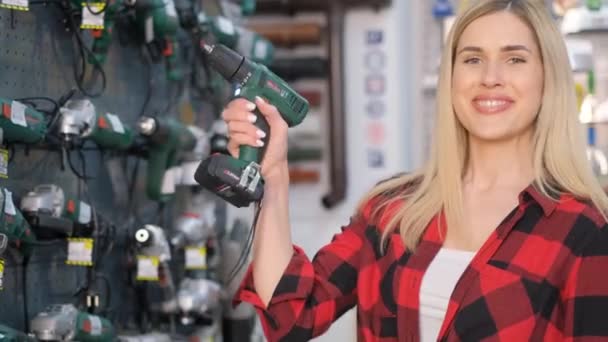 Attractive Blonde Saleswoman Holding Screwdriver Hardware Store Goods Home Repair — Stock Video
