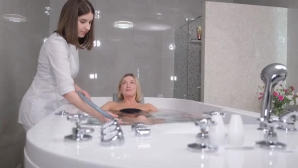 Health Massage Jet Water Young Beautiful Blonde Hydro Procedures Spa — Stockvideo