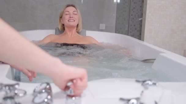 Satisfied Blonde Lies Hot Tub Warm Bubbles Spa Procedures Relaxation — Vídeos de Stock