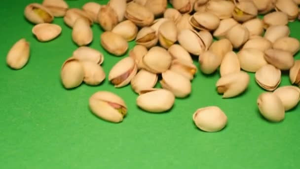 Pistachios Fall Green Background Slow Motion — Video Stock