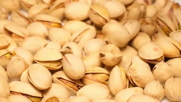Super Slow Motion Pistachios Falling Brown Background 240Fps — Stockvideo