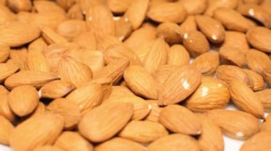 Natural almond close-up, beautiful background, healthy food. Super foods - high in protein, fiber, healthy fat, vitamin E and minerals.