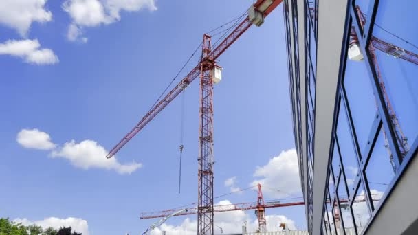 Construction Work High Rise Crane Blue Sky Background Construction New — Stock Video