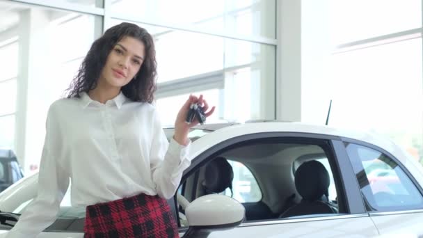 Female Car Sales Manager Shows Keys New Car Car Dealership — Wideo stockowe