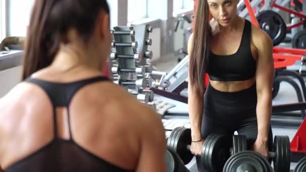Woman Gym Lifts Dumbbells Close Woman Doing Weightlifting Sports Club — 图库视频影像