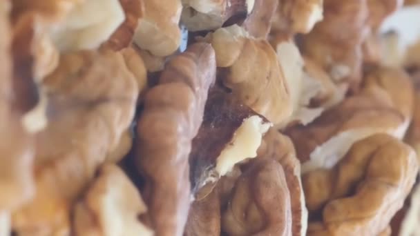 Background Rotating Walnut Shell Large Quantity Peeled Walnut Natural Product — Stock Video