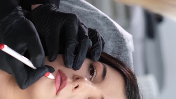Close Girls Face Lip Makeup Permanent Lip Makeup Beautician Applies — Stock Video