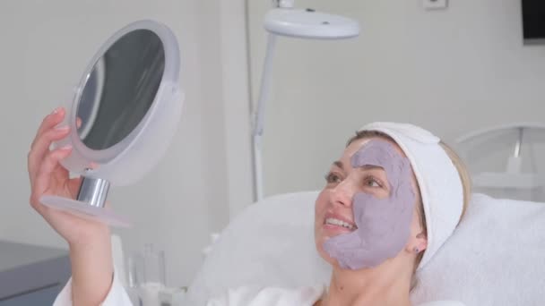 Woman Spa Rejuvenating Facial Treatment Beautician Put Mask Clients Face — Video Stock
