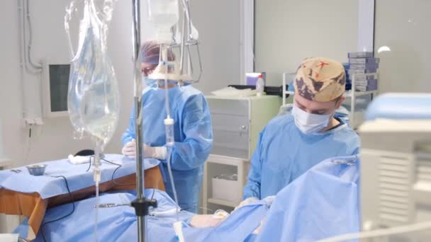 Professional Young Experienced Surgeon Operation Operating Room Complex Operation Patient — Stock Video