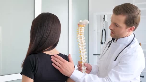 Young Woman Examined Vertebrologist Professional Doctor Examines Back Palpates Patients — Stock Video