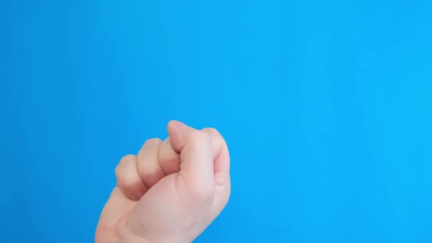 Male Hand Showing Middle Finger Insulting Gesture Isolated Blue Background — 图库视频影像