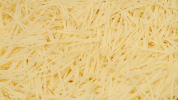 Macro Video Instant Noodles Spinning Circle Raw Macaroni Top View — Stock Video