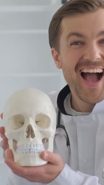 Young Doctor Holding Model Anatomical Human Skull Office Neurologist Having — Stock Video