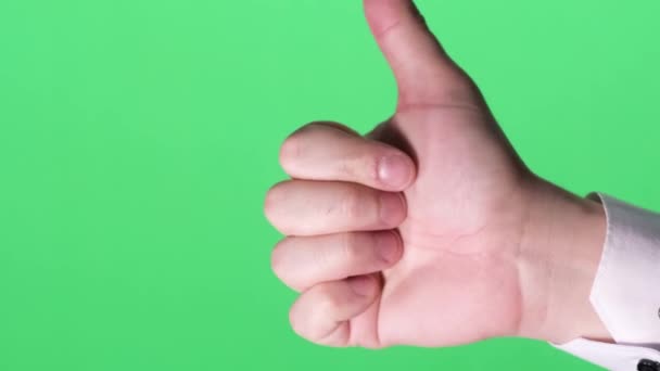 Męska Ręka Zielonym Tle Męska Ręka Kciukiem Górze Gesty Pionowe — Wideo stockowe