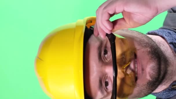 Portrait Handsome Worker Yellow Helmet Wearing Safety Glasses Looking Camera — Stock Video