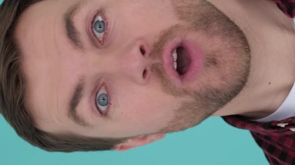 Portrait Man Standing Blue Looks Fascinated What Sees His Face — Stock Video